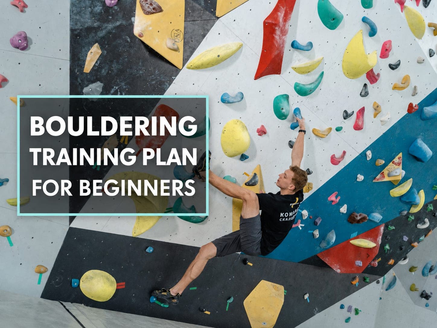 Beginner boulderer working a problem on an indoor bouldering wall.